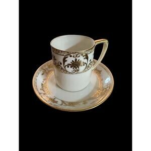 Vintage Noritake Christmas Ball flat demitasse cup and saucer set.